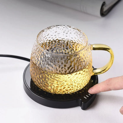 Smart Coffee Mug Cup Warmer for Office and Home with Three Temperature Settings, Waterproof, and Thermostatic Heat Pad.
________
مدفأة ذكية لأكواب القهوة للمكتب والمنزل بثلاث درجات حرارة، مقاومة للماء، ولوحة تسخين حرارية ثابتة.